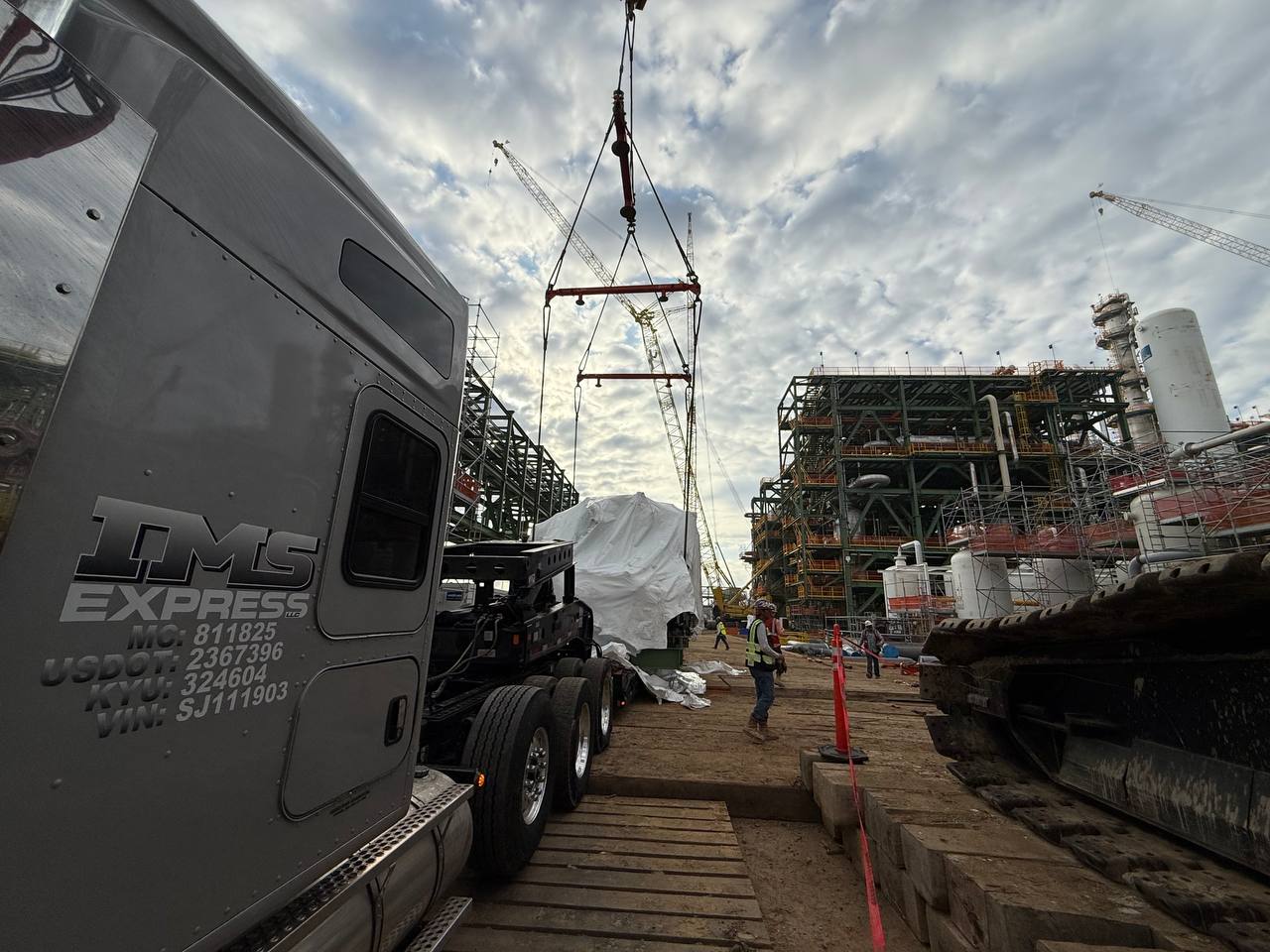 IMS Express truck at industrial construction site with cargo